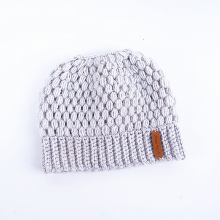 winter earmuffs wool hat fashion labeling empty top hat Europe and the United States new knit hat winter ladies horsetail hat J&E Discount Store